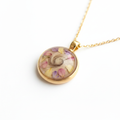 Collier pendentif fleurs poils animal